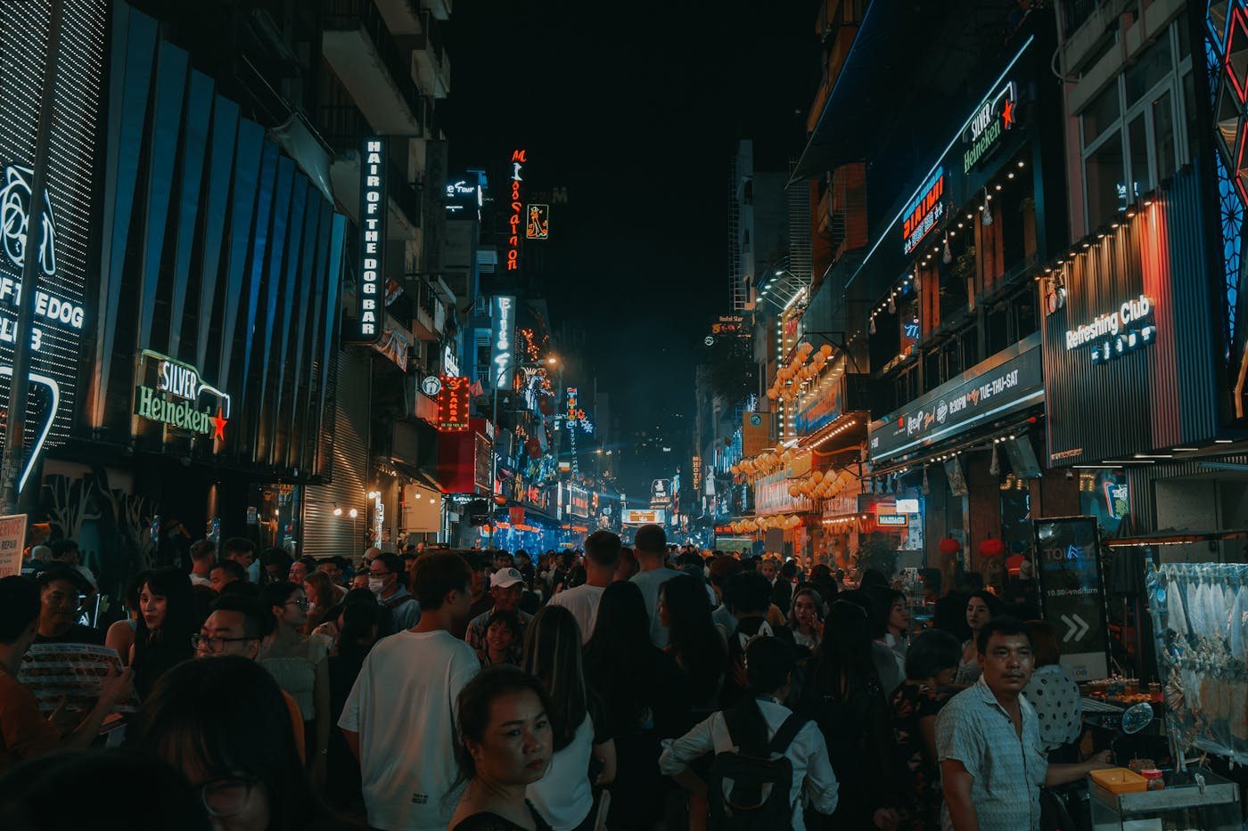 Nightlife atmosphere with crowd, lights, and evening energy